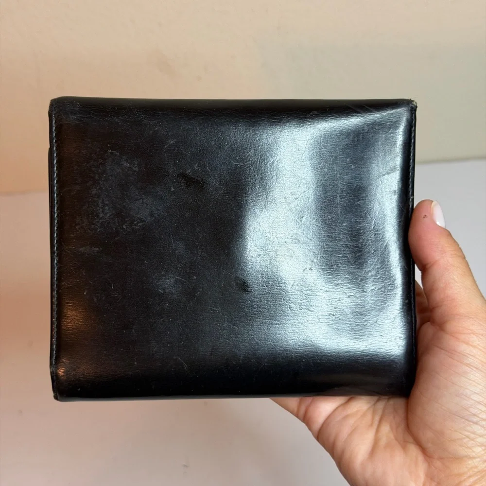 Cartier Panthère Trifold Wallet with a Silver-finish Panther Head motif closure